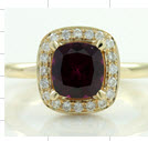 Garnet And Diamond Halo Ring In 14k Yellow Gold (7mm)