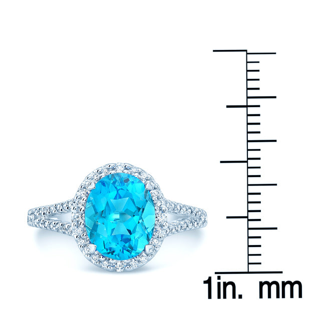 Blue Topaz And Diamond Oval Halo Split Shank Ring In 14k White Gold ( Hi / Si )