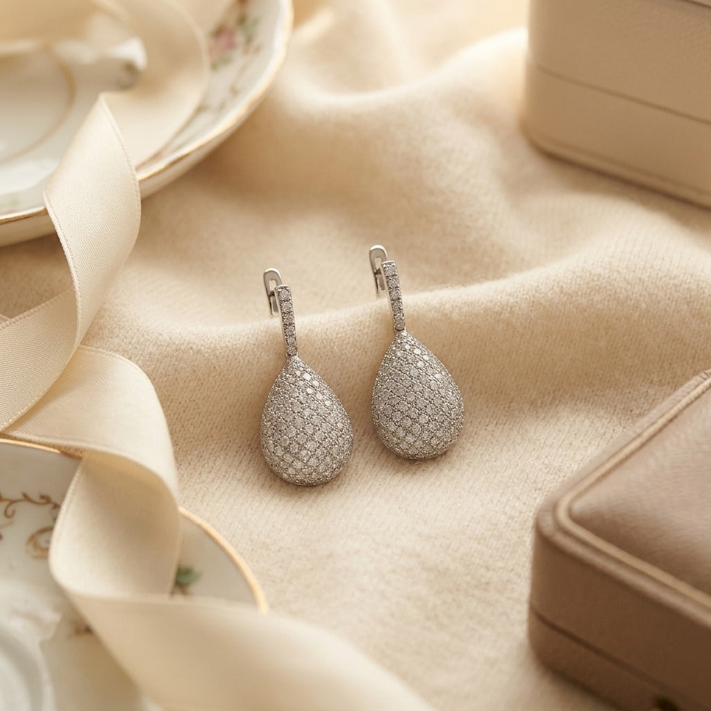 Diamond Puff Pave Teardrop Pendant in 18k White Gold, 17-Inch Rolo Chain — textile flat lay