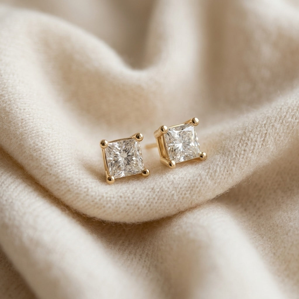 18k Yellow Gold 4-Prong Princess Diamond Stud Earrings (0.75 Ct. T.w., Si1-2 Clarity, H-I Color) — textile flat lay