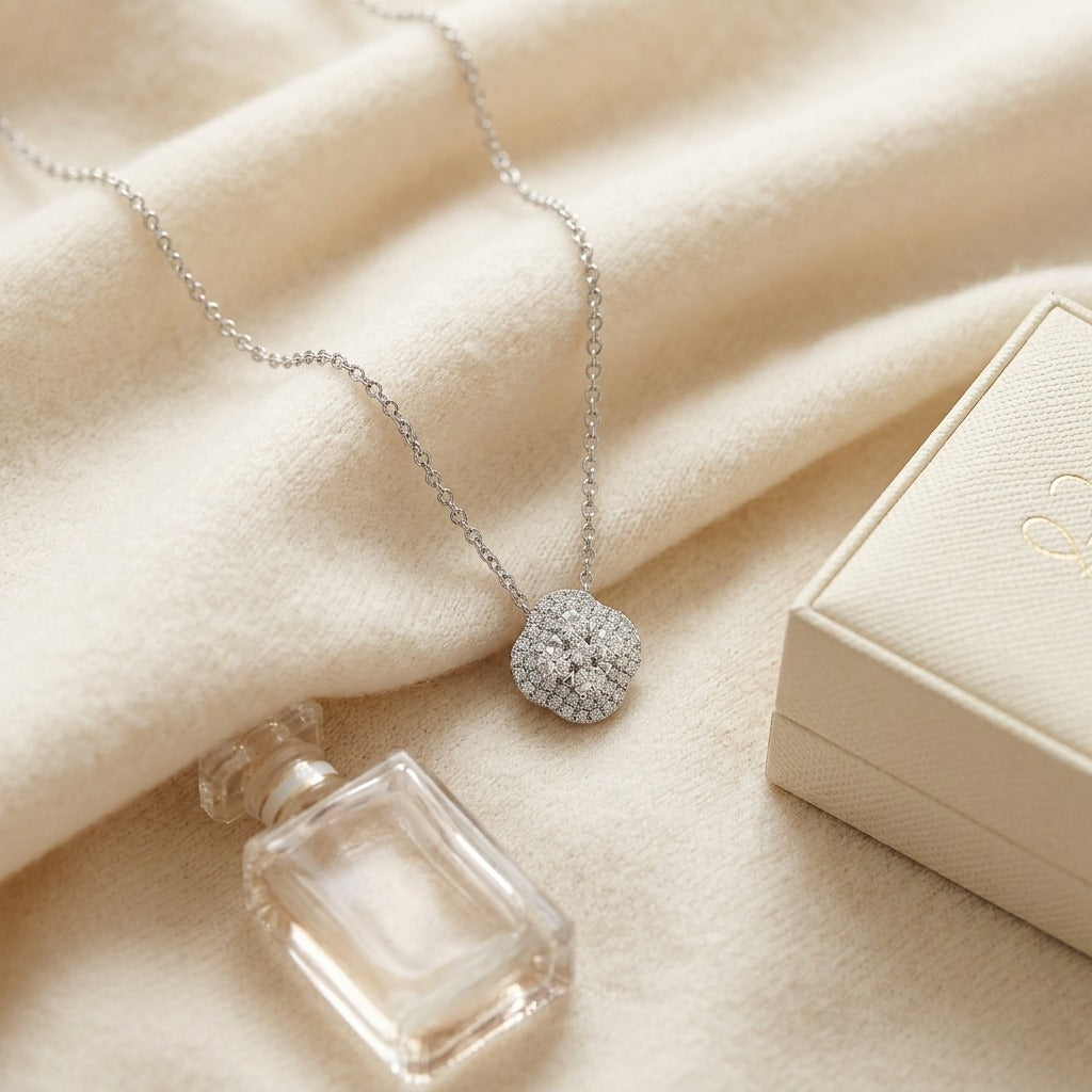 Diamond Clster and Cushion Shape Pendant with Micro-Prong Set Border in 14k White Gold — textile flat lay