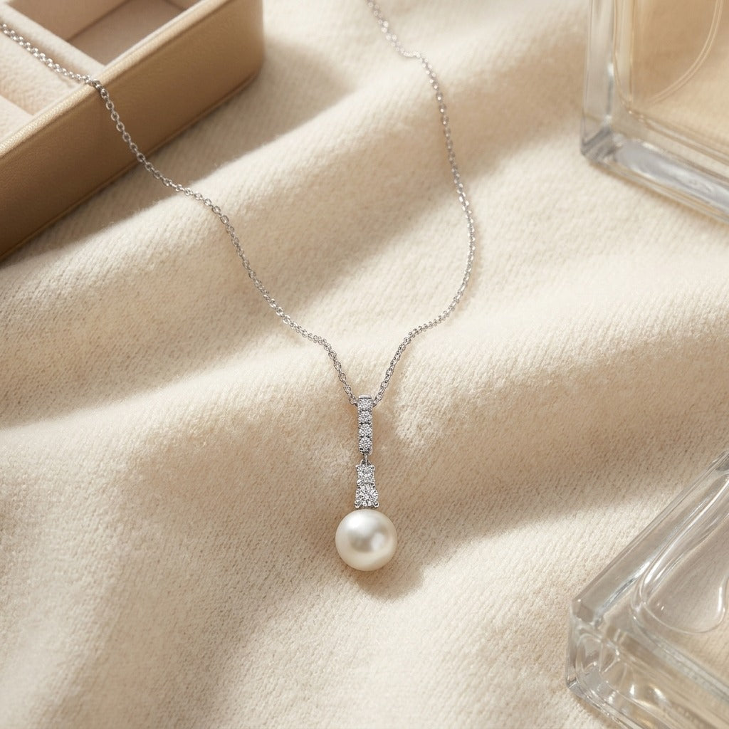 Cultured Pearl and Diamond Pendant with Graduated Prong-Set Bail in 14k White Gold (8.0-8.5mm) (Si) — textile flat lay