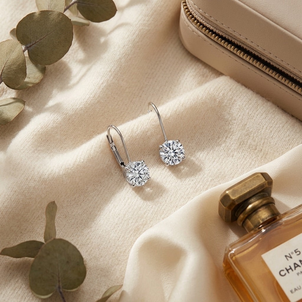 Diamond Leverback Solitaire Earrings In 14k White Gold 1-5/8ctw — textile flat lay