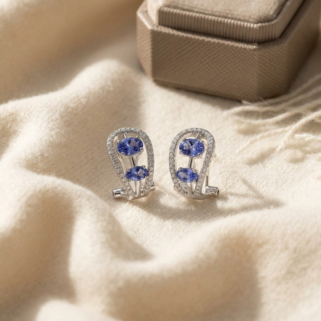 Tanzanite and Diamond Open Work Earrings in 14k White Gold (1/3 Ct.tw.) — textile flat lay