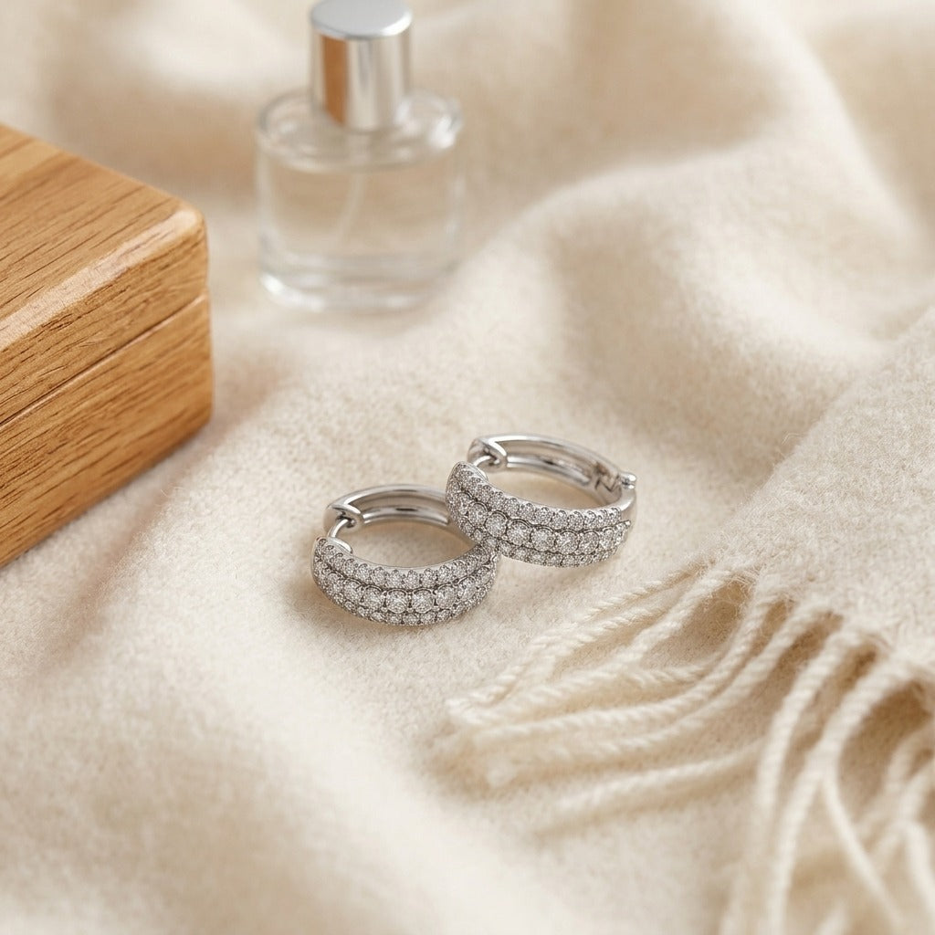 Diamond Pave Hoop Earrings in 14k White Gold — textile flat lay