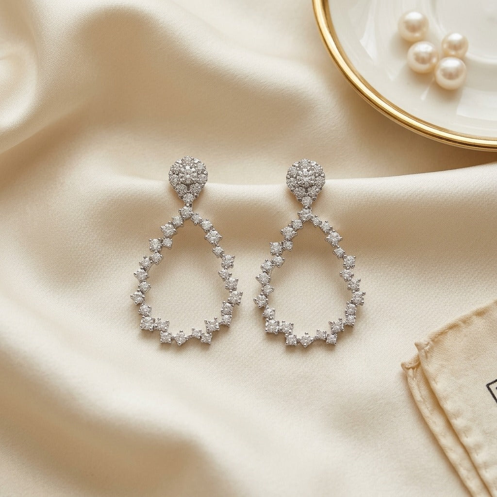 Diamond Pear Cluster Stud Earrings With Removeable Dangle Teardrop in 14k White Gold 1-1/4ctw — textile flat lay
