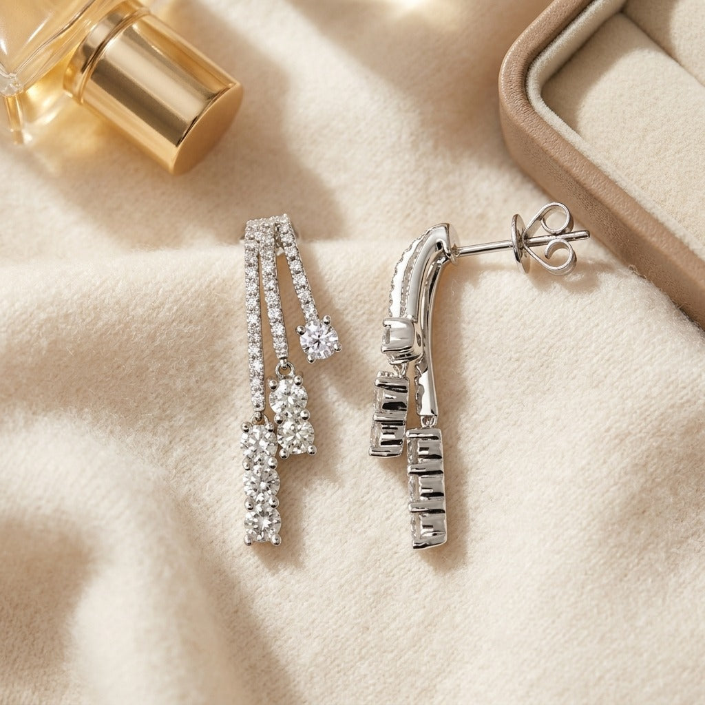 Diamond Three Strand Flair Earrings in 14k White Gold (1-1/5ctw) — textile flat lay