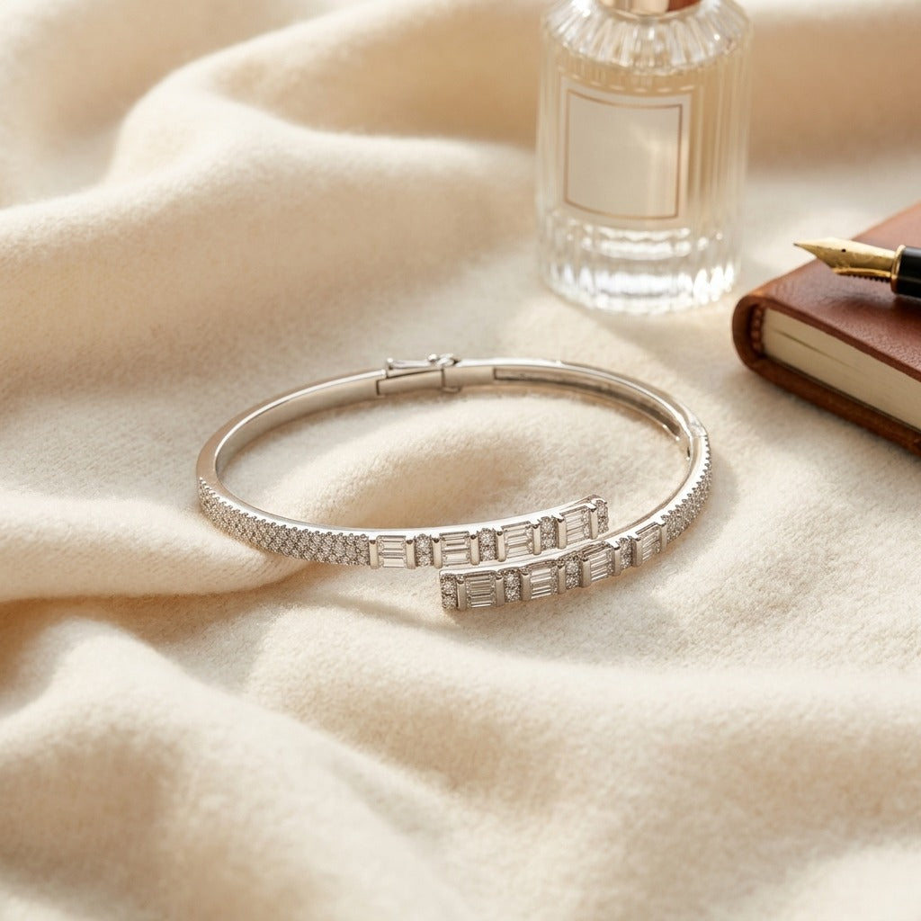 Diamond Baguette and Round Channel Overlap Bangle in 14k White Gold 1-5/8ctw — textile flat lay
