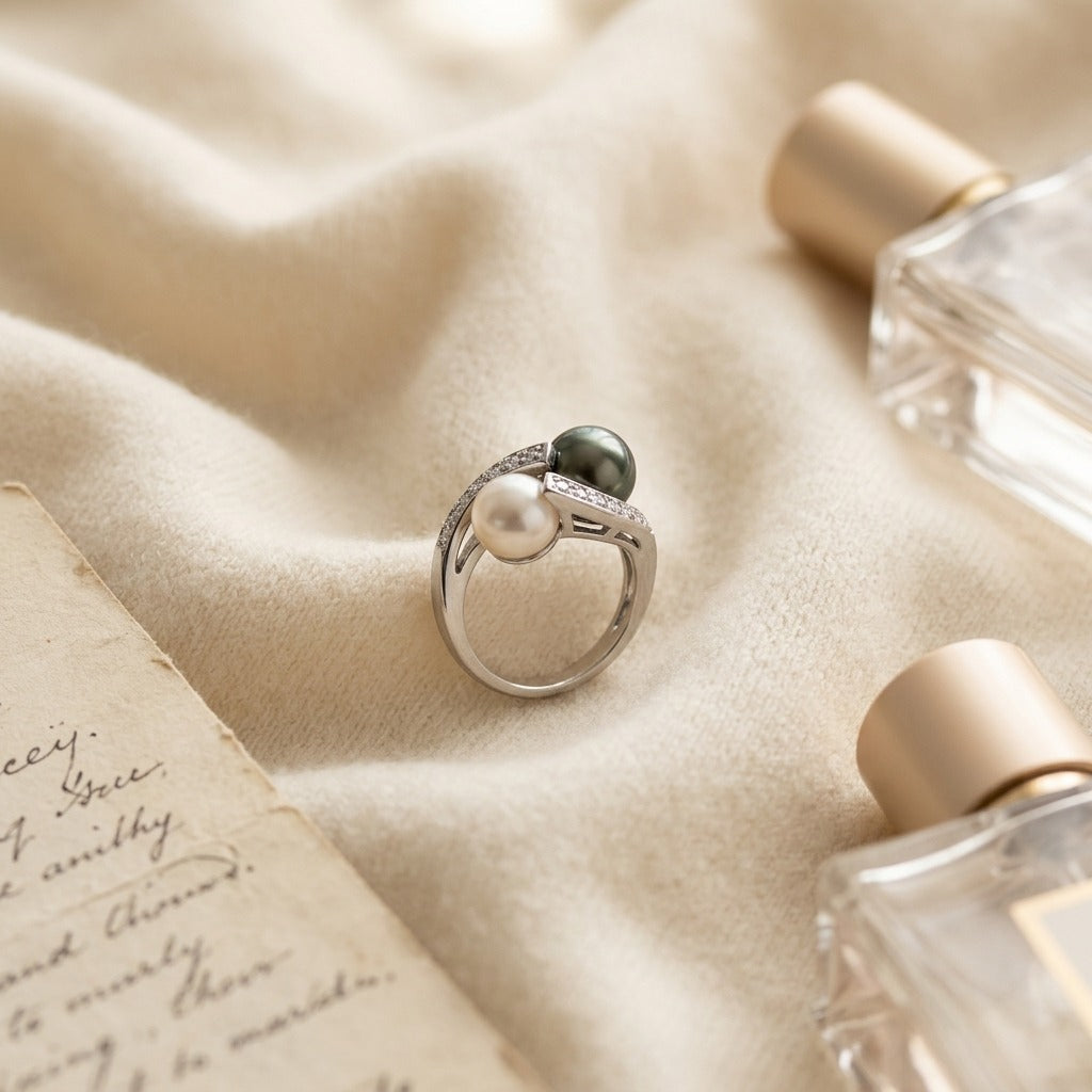 Black South Sea Pearl And White Akoya Pearl Ring In 14k White Gold — textile flat lay