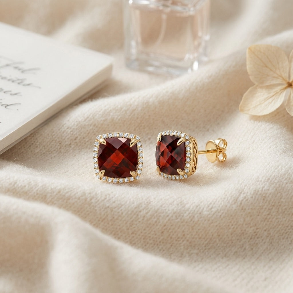 Garnet Cushion And Pave Diamond Earrings In 14k Yellow Gold (1/5 Ct. Tw.) — textile flat lay