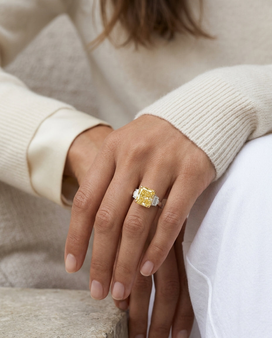Prong Set Gia Certified Fancy Intense Yellow Diamond Engagement Ring In Platinum — editorial close-up