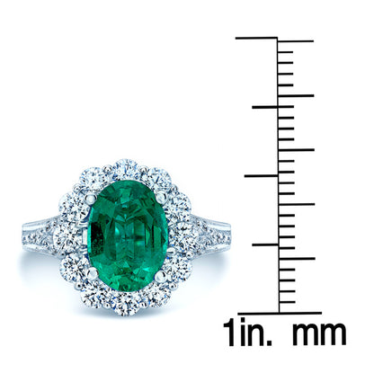 Emerald Oval And Diamond Halo Ring In 14k White Gold