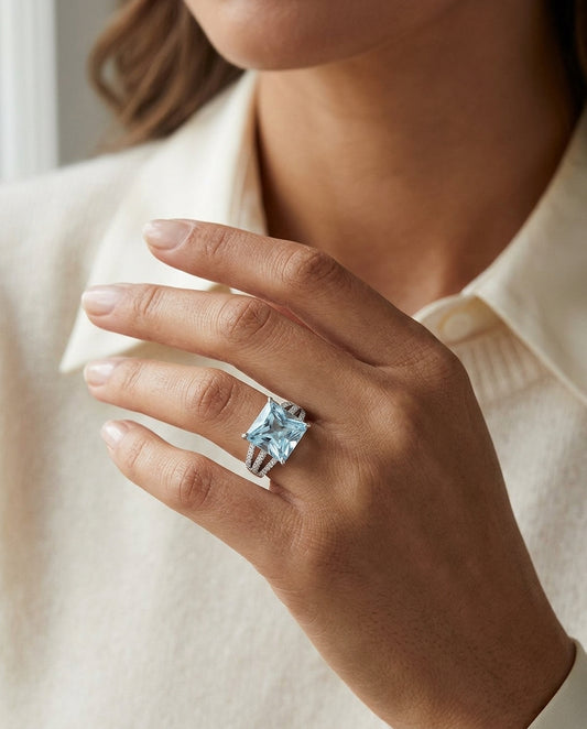 Aquamarine And Diamond Split Shank Ring In 18k White Gold — editorial close-up
