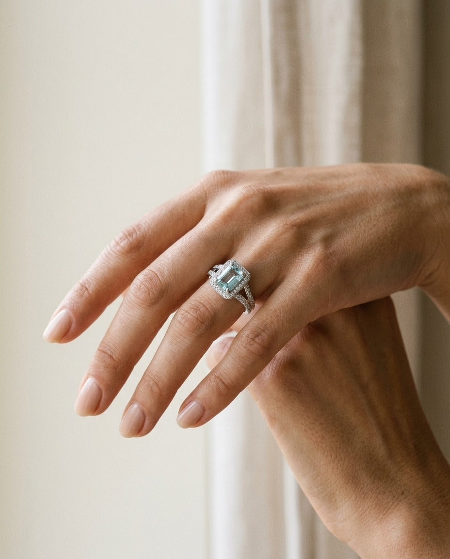 Aquamarine And Diamond Halo Ring — portrait close