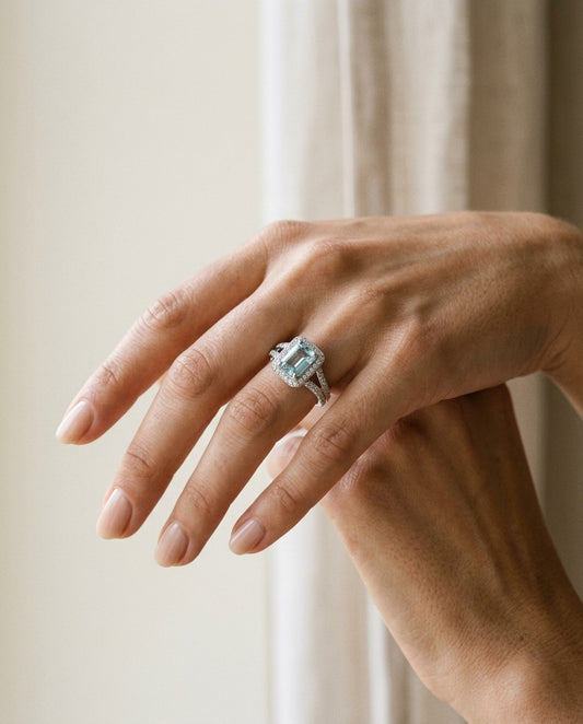 Aquamarine And Diamond Halo Ring — portrait close