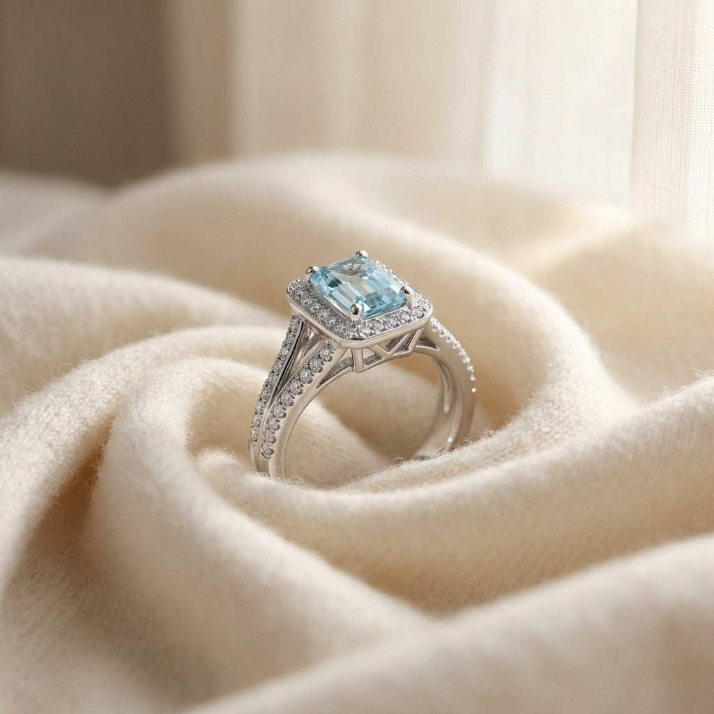 Aquamarine And Diamond Halo Ring — textile flat lay