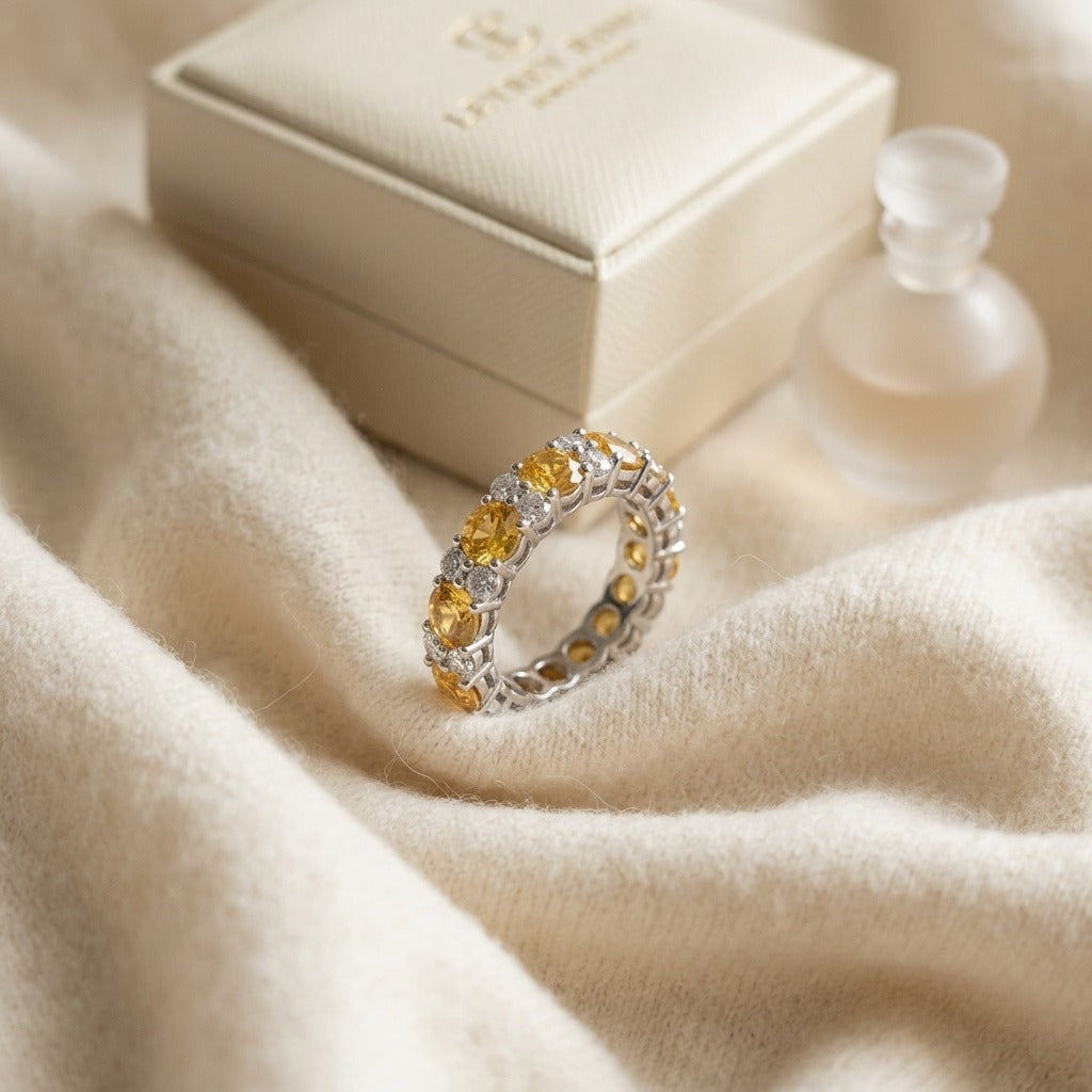 Yellow Sapphie And Diamond Band In 18k White Gold — textile flat lay
