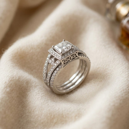 Diamond Square Halo Split Heart Shank Bridal Set in 18k White Gold — textile flat lay