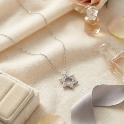Diamond 1/4ctw Star Pendant In 18k White Gold — textile flat lay