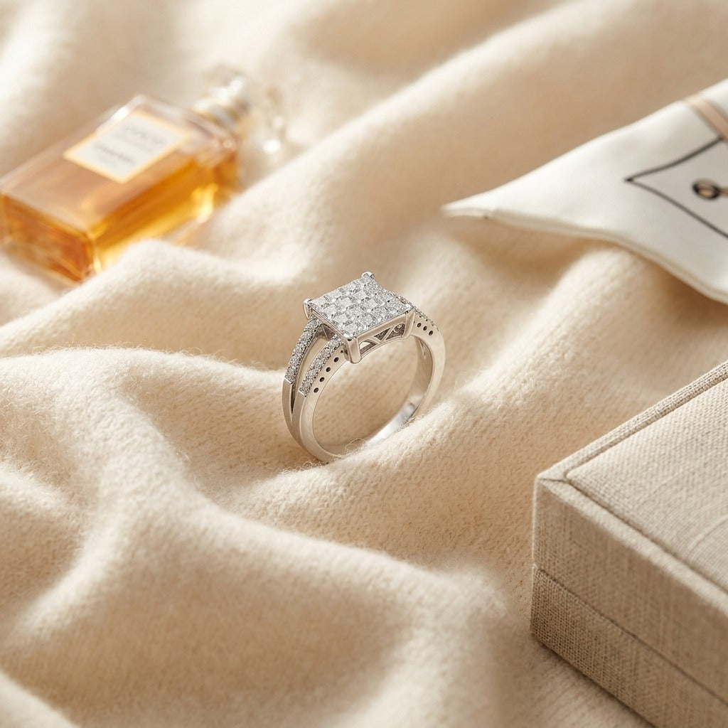 Diamond Princess Invisible-Set Square Center with Round Prong Split Shank in 18k White Gold — textile flat lay
