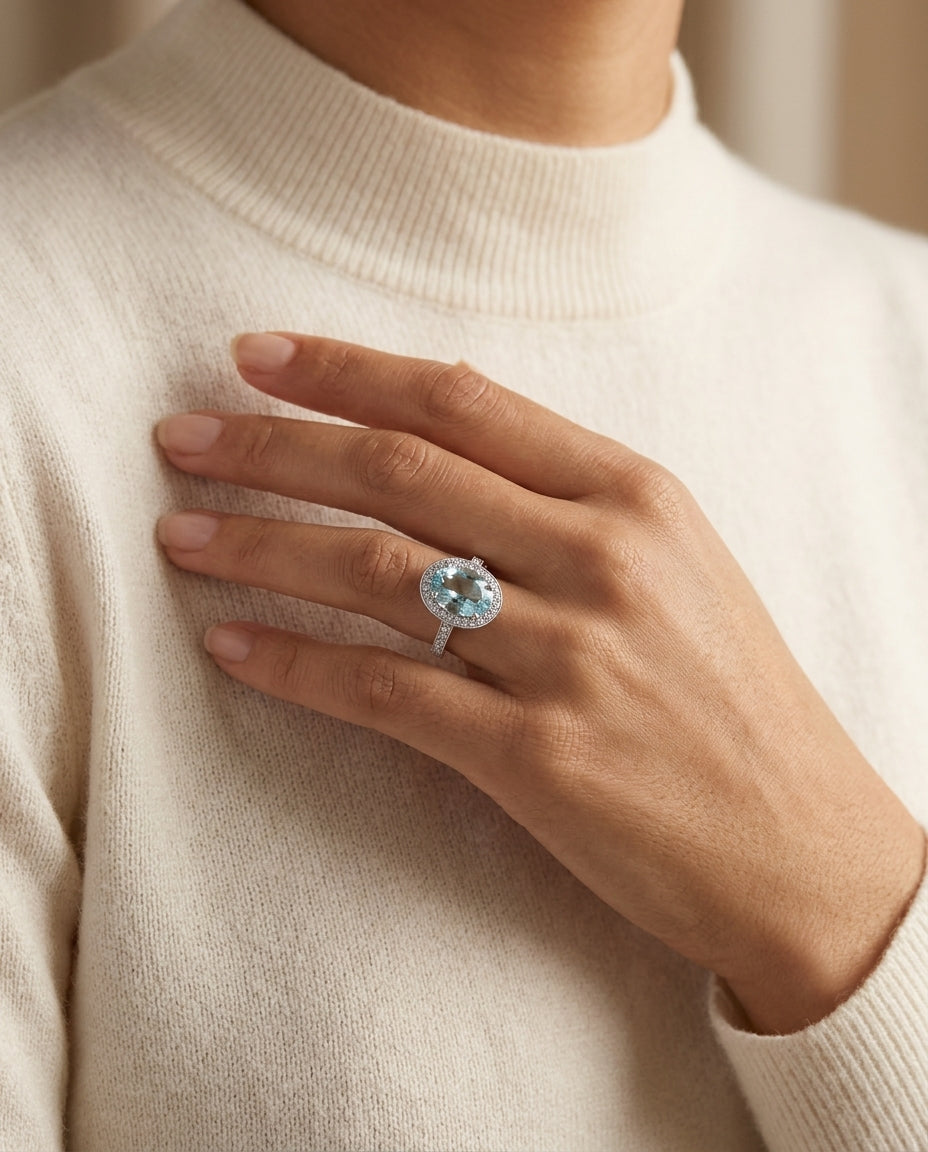 Aquamarine And Diamond Oval Halo Ring In 18k White Gold — editorial close-up