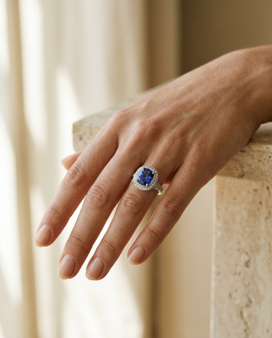 Sapphire And Diamond Cushion Halo Ring With Pave Shoulders And Gallery In 18k White Gold — portrait close