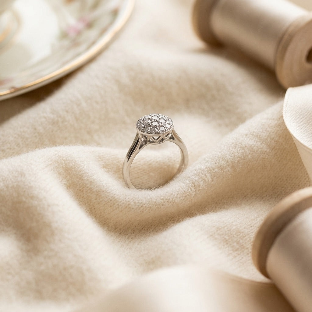 Diamond Domed Puff Pave Ring With High Polish Shank In 18k White Gold — textile flat lay
