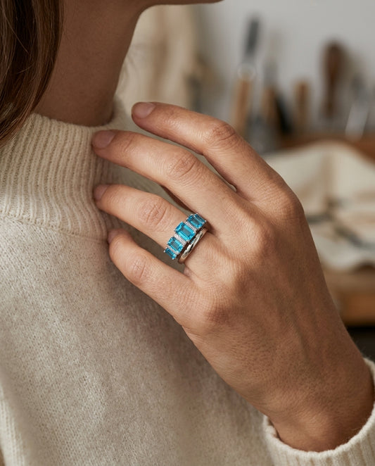 Swiss Blue Topaz 5 Stone & Diamond Emerald Cut Ring In 18k White Gold — editorial close-up