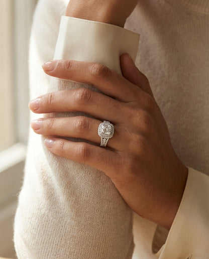 Prong Set Double Halo Cushion Cut Engagement Ring In 18 Karat White Gold — editorial close-up
