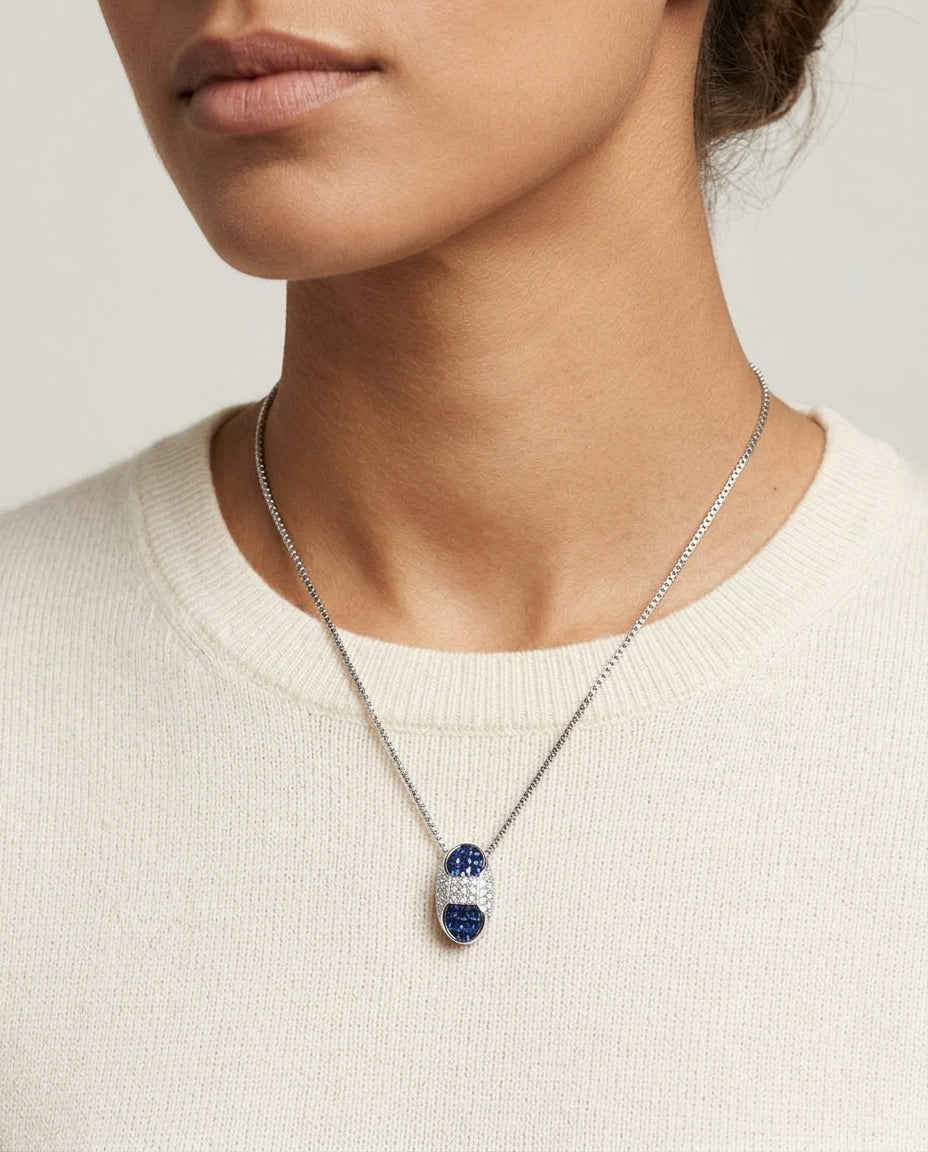 Sapphire And Diamond Capsule Pendant In 18k White Gold (17-in Box Chain) — editorial close-up