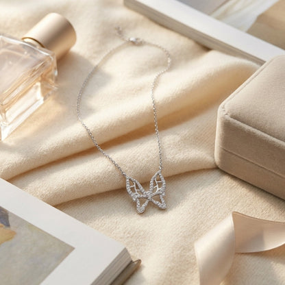 Diamond Floating Butterfly Necklace In 18k White Gold 1/10ctw 17in Cable Chain — textile flat lay