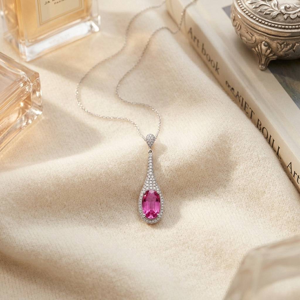 Pink Sapphire and Diamond Handmade Paddle Pendant in 18k White Gold — textile flat lay