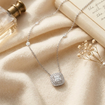 Diamond Double Entourage Cushion Cut Pendant In 18k White Gold 1.72ctw — textile flat lay