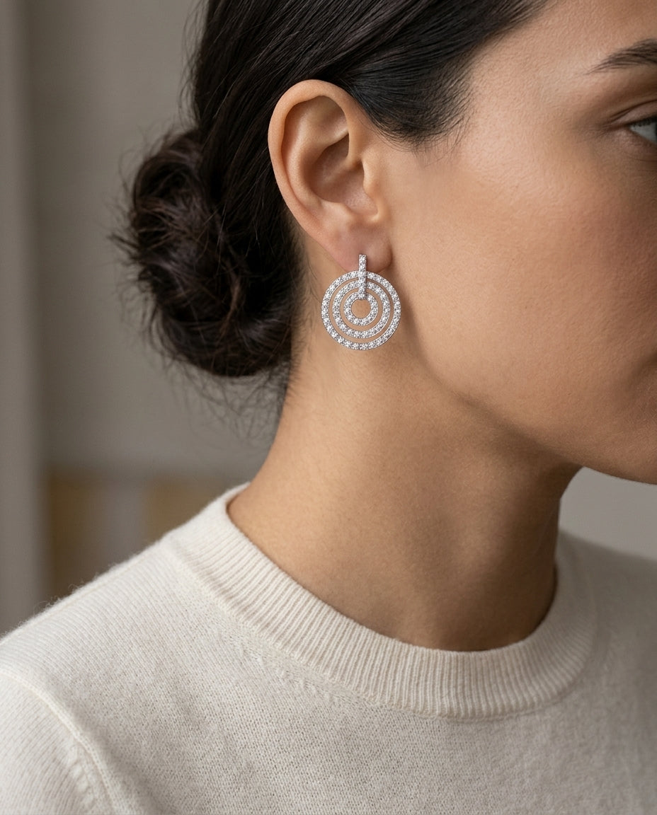 18k White Gold 1ctw Brilliant Round Diamond Doorknocker Earring — editorial close-up