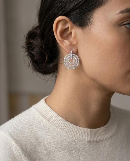 18k White Gold 1ctw Brilliant Round Diamond Doorknocker Earring — editorial close-up
