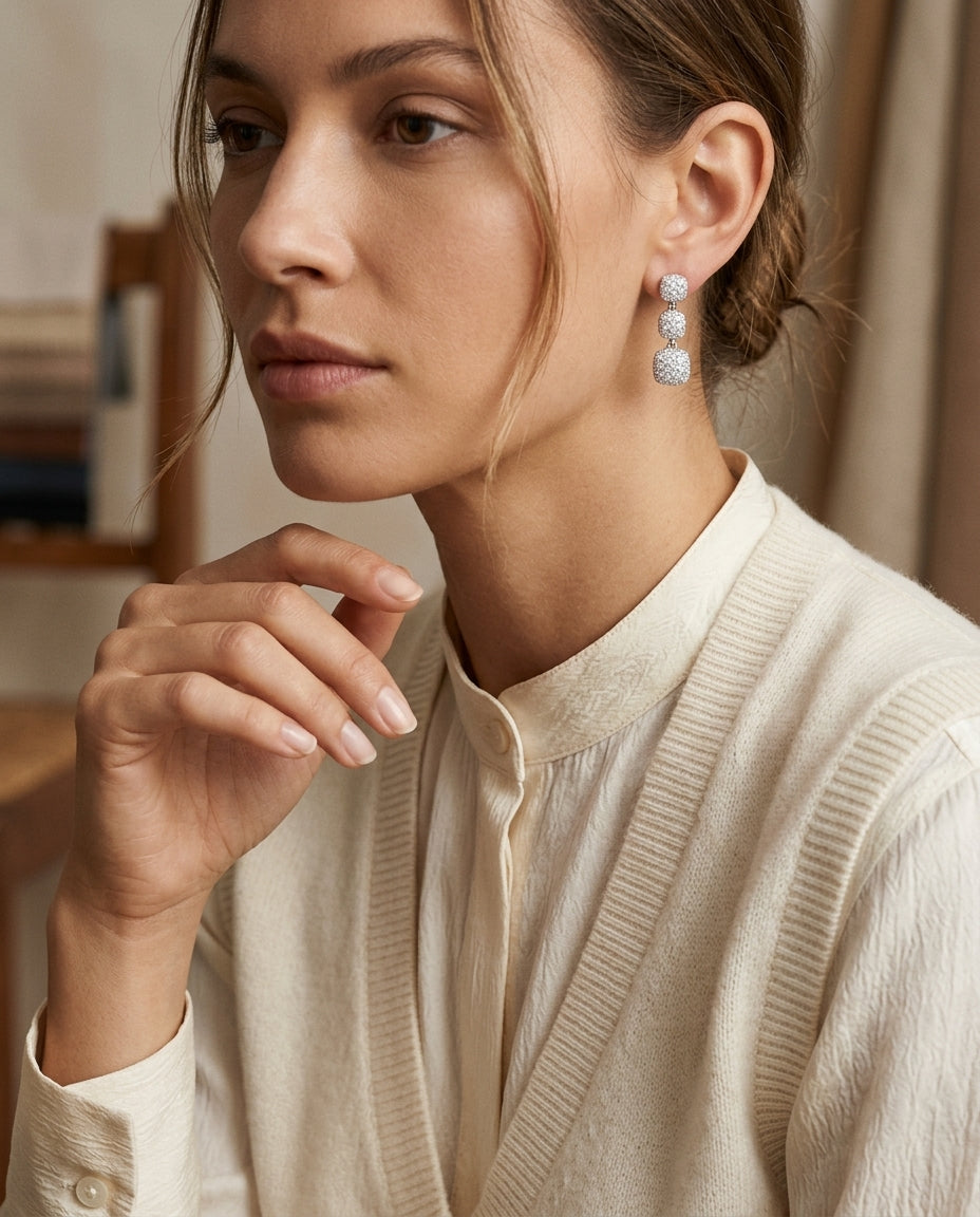 Diamond Graduated Cushion Drop Earrings In 18k White Gold — editorial close-up