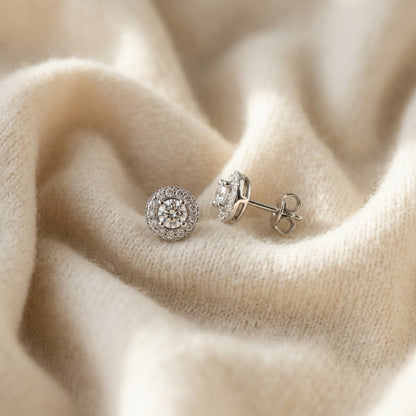 Pave Diamond Halo Stud Earringss In 14k White Gold (1/2 Ct.tw.) — textile flat lay