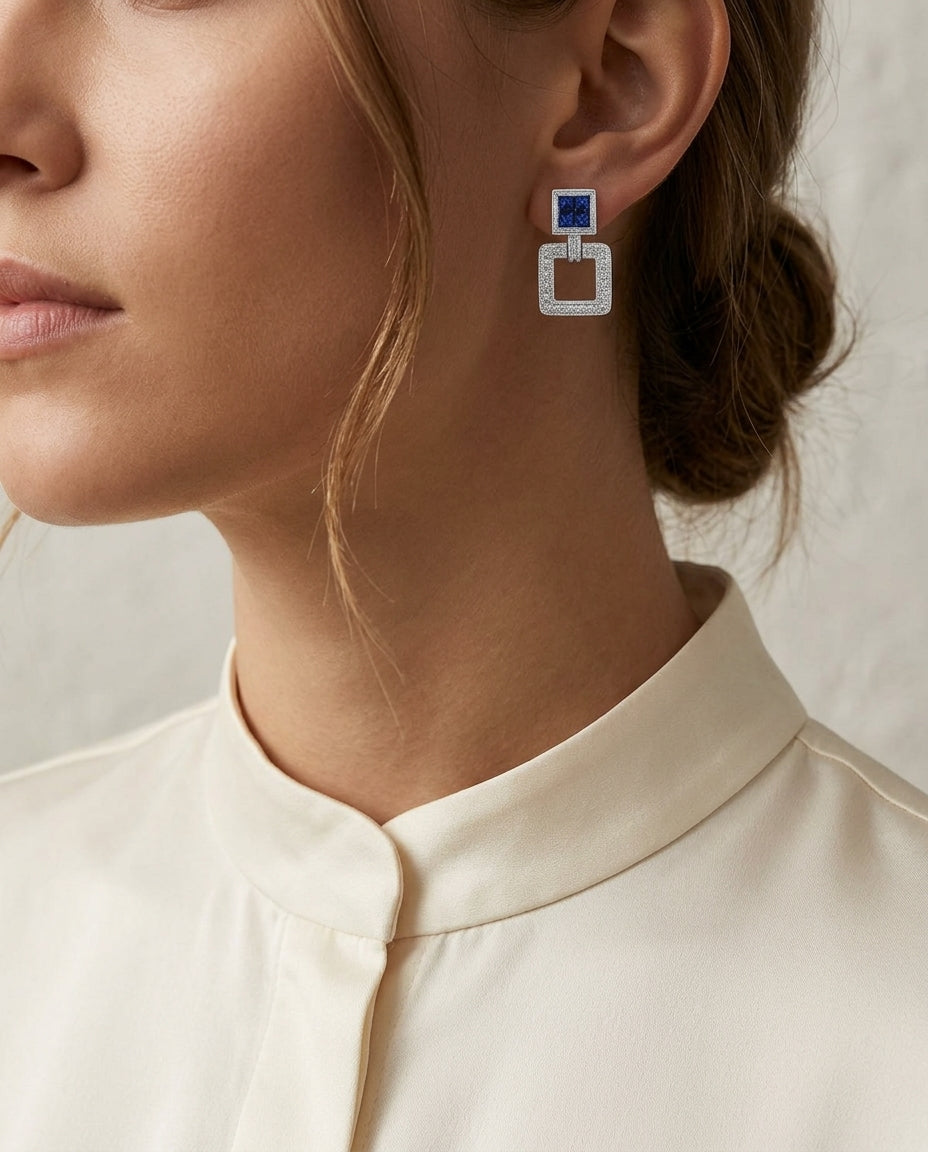 Sapphire And Diamond Art Deco Doorknocker Earrings In 18k White Gold — editorial close-up