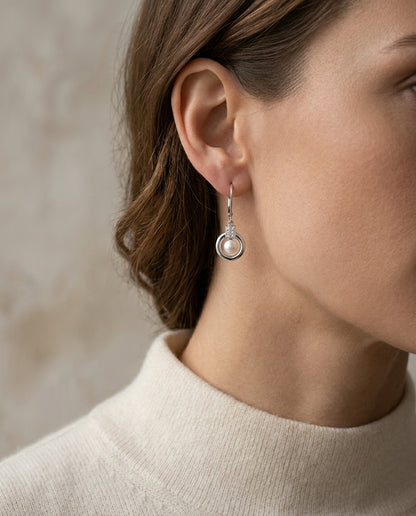 Pearl And Diamond Door Knocker Leverback Earrings In 18k White Gold — editorial close-up