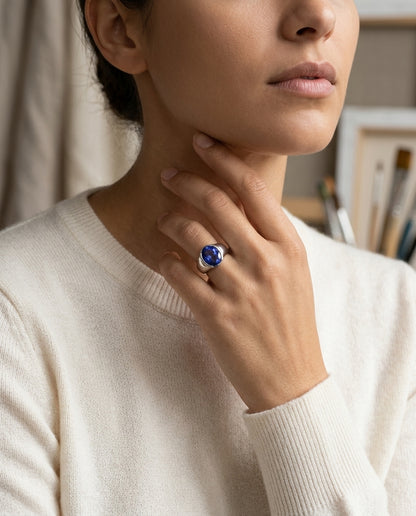 Tanzanite Oval Half-bezel Ring In 18k White Gold (14x10mm) — editorial close-up
