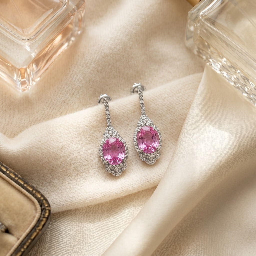 Pink Sapphire And Diamond Dangle Oval Earrings In 18k White Gold — textile flat lay