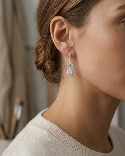 Coronet Diamond Leaf Teardrop Dangle Earring In 18k White Gold — editorial close-up