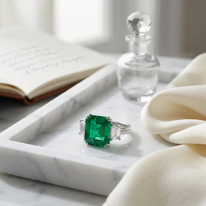 Prong Set Three Stone Emerald And Diamond Ring In 18k White Gold — atelier still life