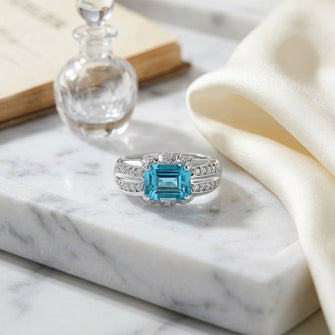 Aquamarine And Diamond Sideways Emerald Cut Ring In 18k White Gold — atelier still life