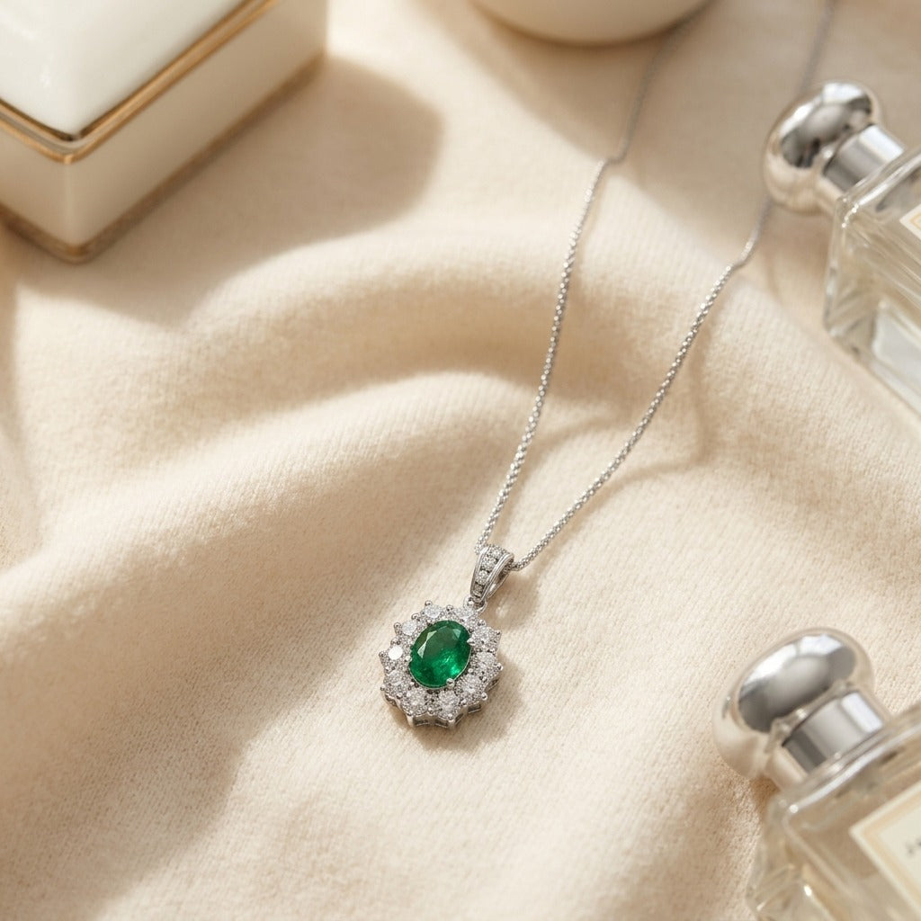 Emerald Oval and Diamond Pendant in 18k Gold (8x6mm) — textile flat lay