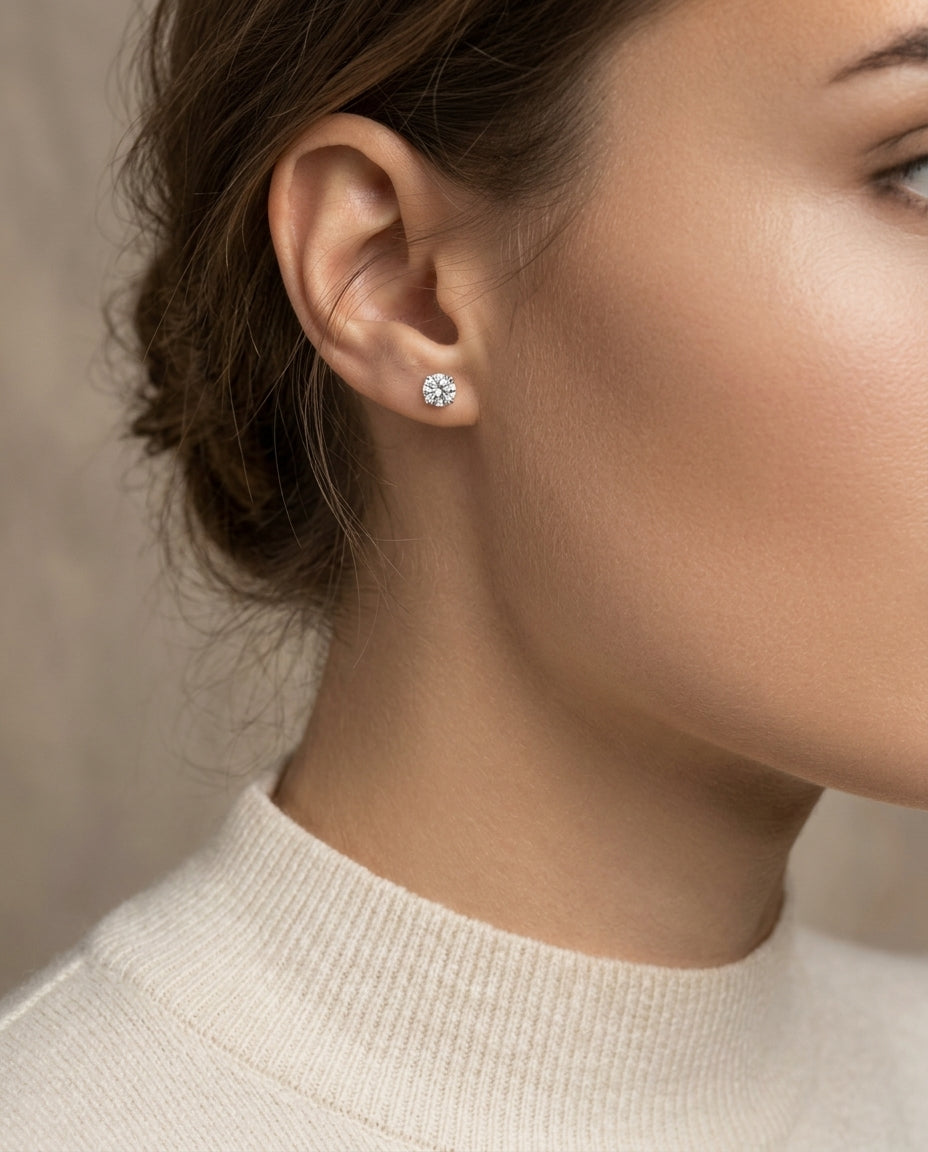18k White Gold 4-prong Round Brilliant Diamond Stud Earrings (0.75 Ct. T.w., Vs1-vs2 Clarity, H-i Color) — editorial close-up
