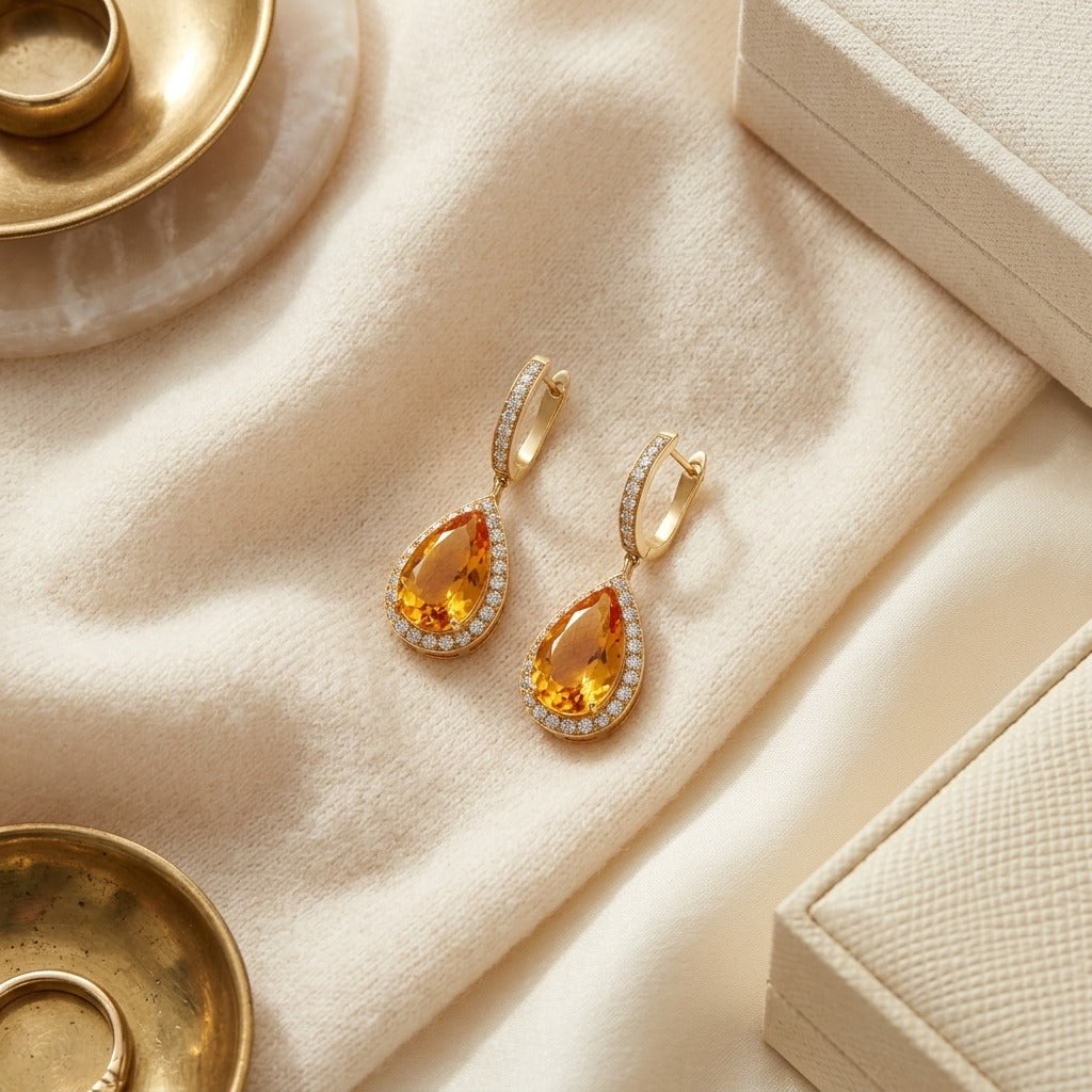 Citrine Pear And Diamond Halo Earrings In 18k Yellow Gold (1 1/6 Ct. Tw.) — textile flat lay