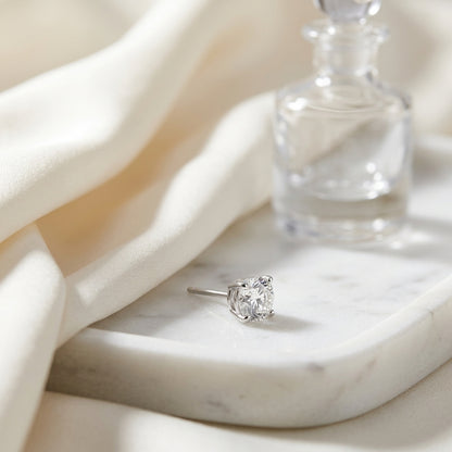 18k Yellow Gold 4-prong Round Brilliant Diamond Stud Earrings (0.75 Ct. T.w., Vs1-vs2 Clarity, F-g Color) — atelier still life