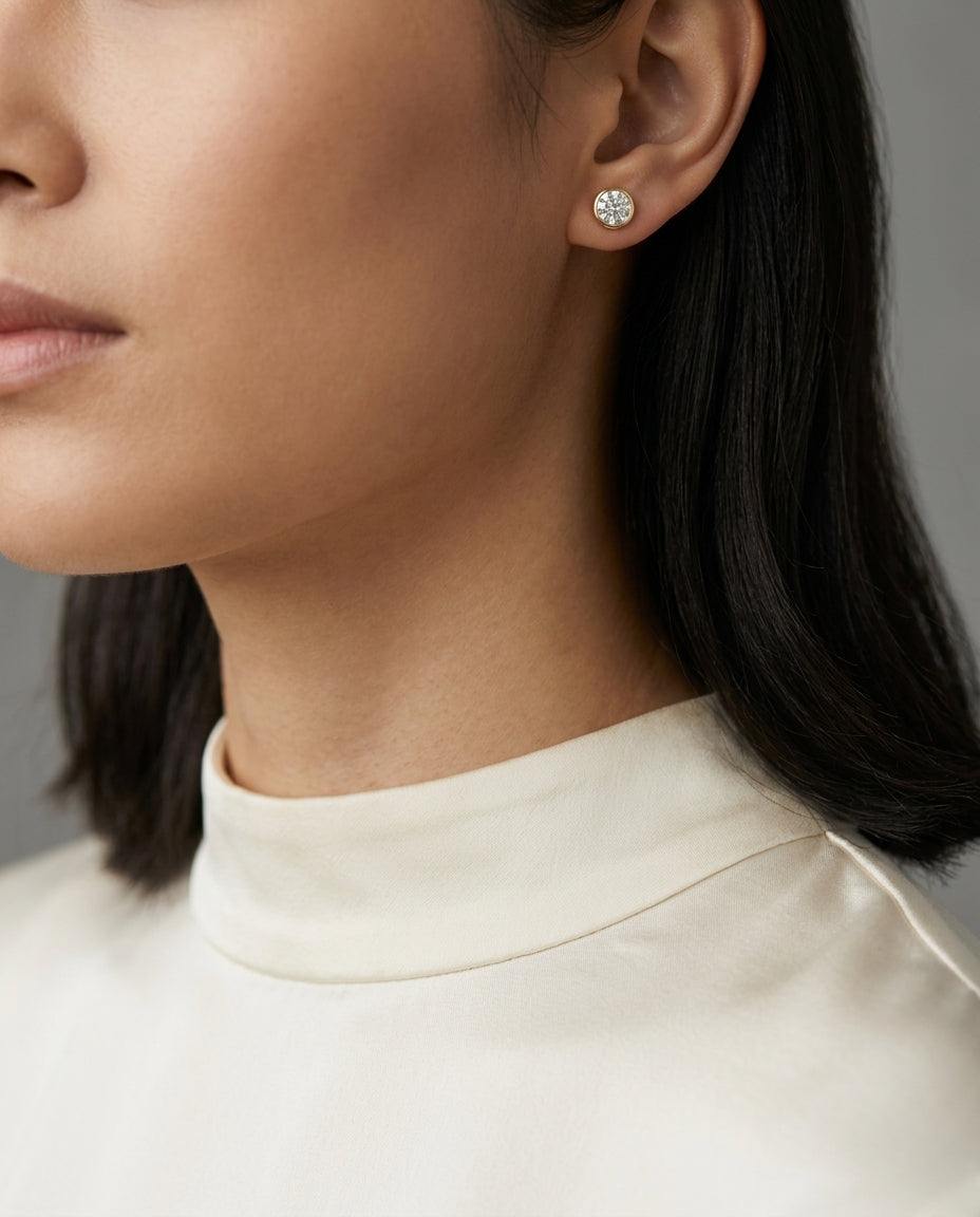 18k Yellow Gold Bezel Set Round Brilliant Diamond Stud Earrings (1.48 Ct. T.w., Vs1-vs2 Clarity, H-i Color) — editorial close-up