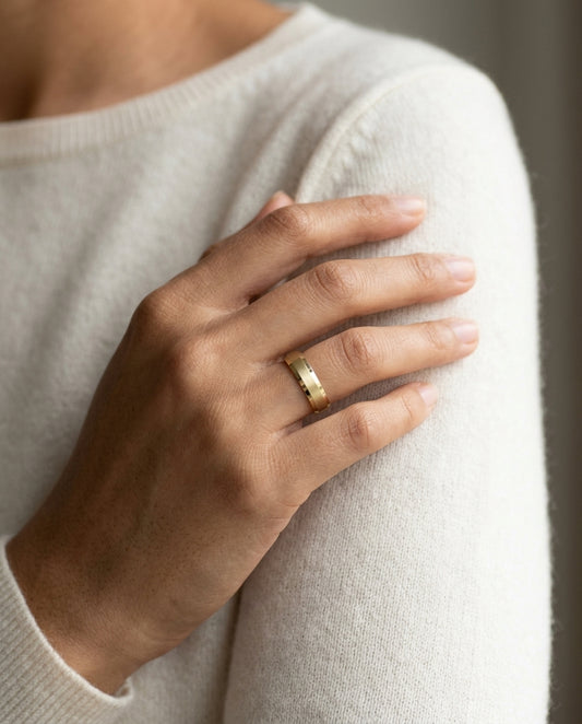 14k Yellow Gold 5mm Comfort Fit Matte Center, High Polish Beveled Edge Band — editorial close-up